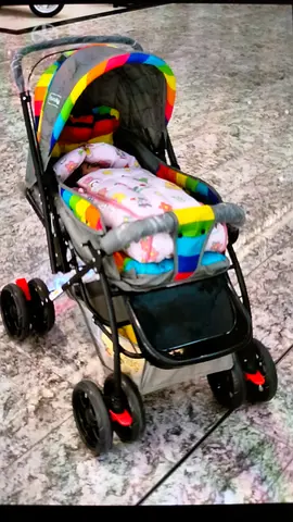 Lightweight rainbow baby stroller/pram in good used condition
