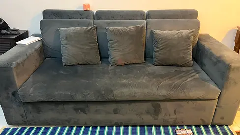 Grey 3-seater sofa bed with cushions - good condition