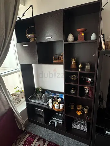 Dark wood entertainment center / shelving unit - good condition