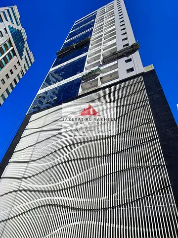 One-bedroom apartment with a living room for sale in Al Nahda