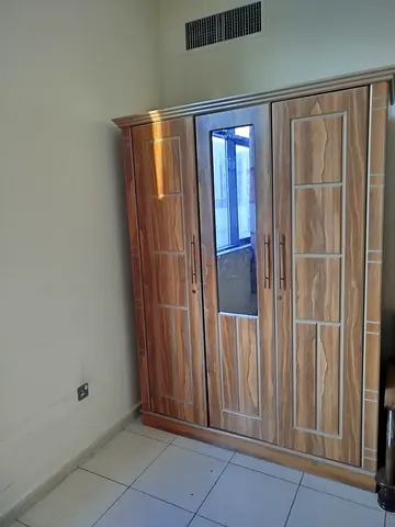 3-door Wooden Wardrobe with Mirror - Good Condition
