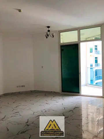 Two bedrooms and a living room for annual rent in Oasis Tower | 16th floor | 1,736 sq ft | Parking | AED 50,000 | 4 installments | AED 5,000 security
