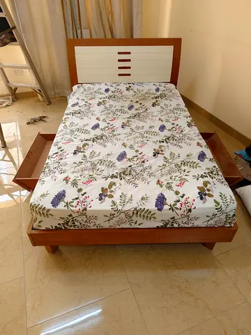 Wooden double bed with headboard and side drawers - good condition