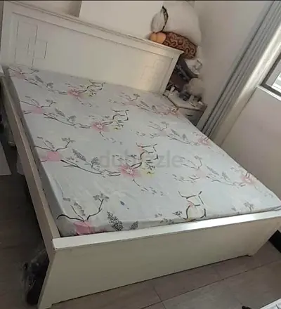White wooden double bed frame with headboard and mattress - good condition