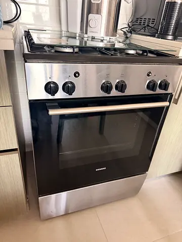 Selling ASAP! Stainless steel built-in gas stove oven in good working condition