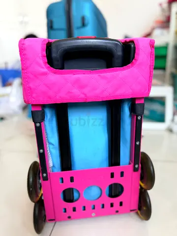 Zuca Pink Kids Trolley bag with Wheels - Good Condition, for AED 220, contact 0545895599