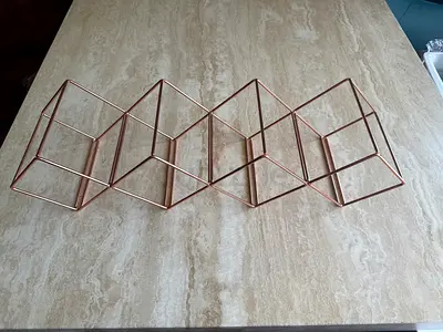 Stackable copper finish wine rack