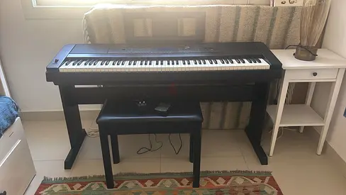 Yamaha digital piano (DGX-660) with stand and bench - excellent condition