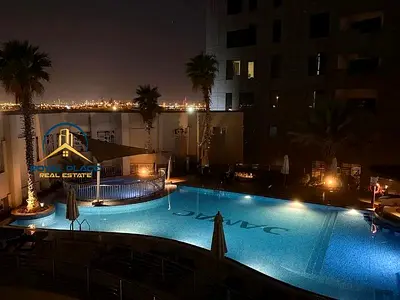 Furnished Studio | Capital Bay A | Pool & Downtown View
