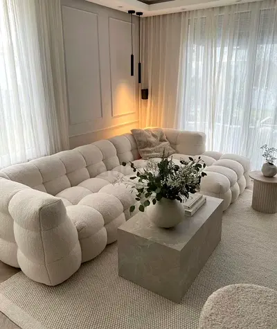 Modern Curved Tufted L-Shaped Bouclé Sofa —