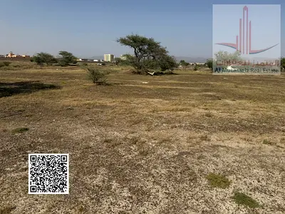 Two residential plots of land for sale in Ajman, Al Manama 4. The plots are corner lots on two streets, totaling 21,862 square feet. Asking 900k