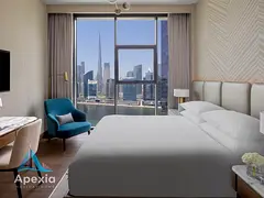 1 Bedroom Residence | Burj Khalifa & Canal View | Dubai