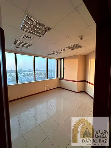 For annual rent in Al Majaz 1: Two offices open to each other with free air conditioning and a discount of 3 months free. A suitable opportunity for d