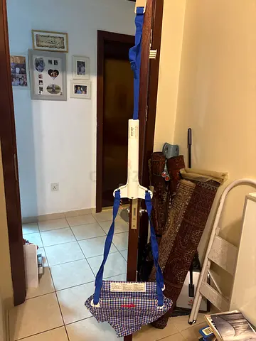 Baby doorway jumper/exerciser - sturdy frame, good condition