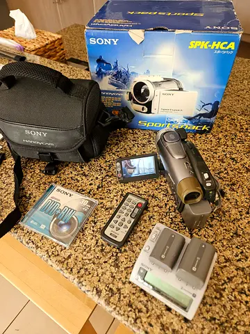 Set of Sony Handycam mini DVD set with underwater camera batteries cases and discs with fish eye als