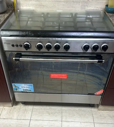 Five burner gas cooker with oven - good working condition