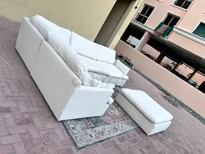 Excellent condition... Home centre Swin feather Filled sofa with ottoman Beige color