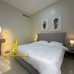 One-bedroom apartment with an open view in Ajman - Corniche - next to Bahi Hotel - furnished, availa