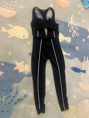Black LORNA JANE women's workout suit with white piping, size M