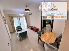 Two bedrooms, living room, balcony, excellent view, two bathrooms, central air conditioning, Al Jurf