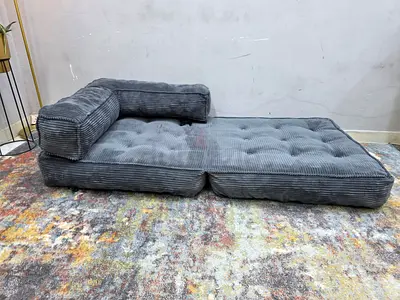 Low-profile modular floor sofa / lounge in grey corduroy