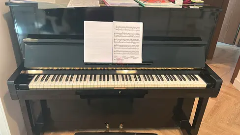 Black Upright Acoustic Piano