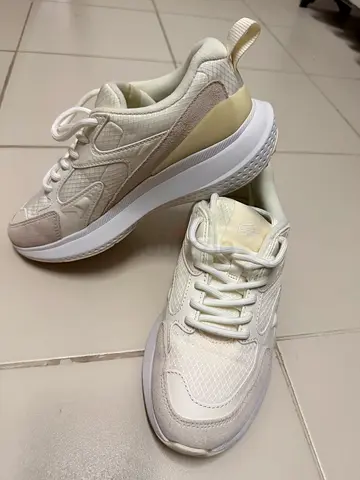 Used once only. Women Lacoste indoor/outdoor shoes.