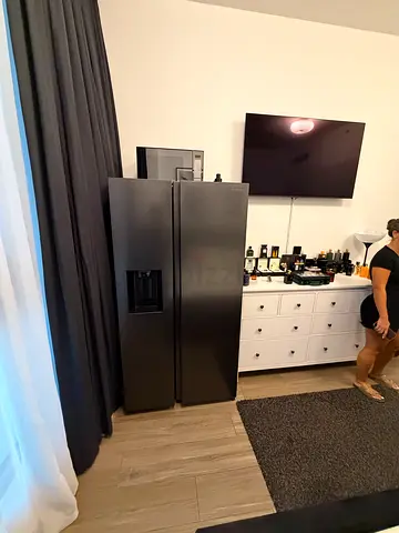 Samsung Black Side-by-Side Refrigerator with Water Dispenser - Good Condition