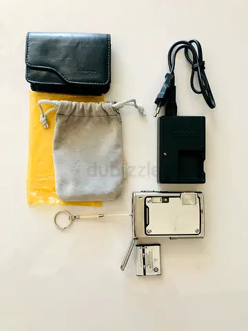 Olympus Stylus 1030 SW 10.1MP - (Digital Camera + Charger + Battery + Memory Card 2GB + Cases)