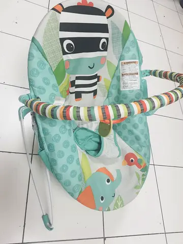 Baby bouncer seat with zebra/elephant print - good used condition