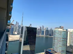 Business Bay Studio | Burj & Canal View | Balcony | Semi-Fitted Kitchen