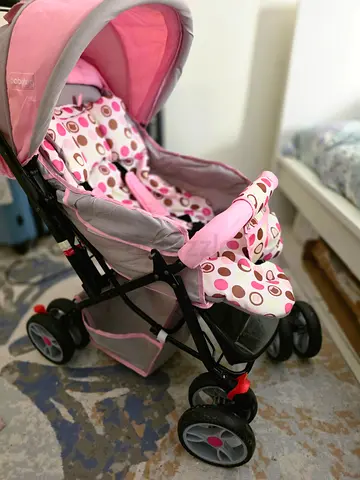 Light Pink Polka Dot Baby Stroller - Good Condition
