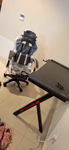 Brand new gaming table with gaming chair available