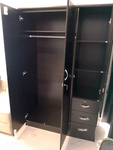 Dark wood 3-door wardrobe with drawers and hanging rail - good condition