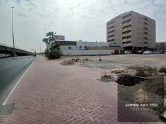 Residential/commercial land for sale in Al Rawda 3, Ajman - directly on two streets, area 8,975 sqft