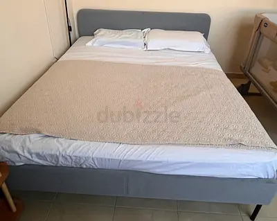 Grey fabric upholstered double bed frame with headboard Ikea Slattum 160x200 no mattress