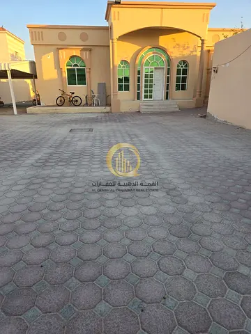 Traditional-style house for sale in Al Juraina, Sharjah; land area is 18,000 square feet.