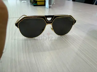 Gold frame black lens designer-style sunglasses faded tint read description
