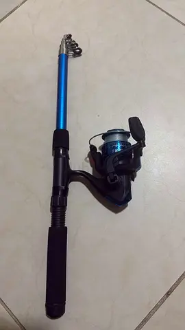 Compact Telescopic Spinning Fishing Rod with Reel - Used includes all hooks fishing line reel