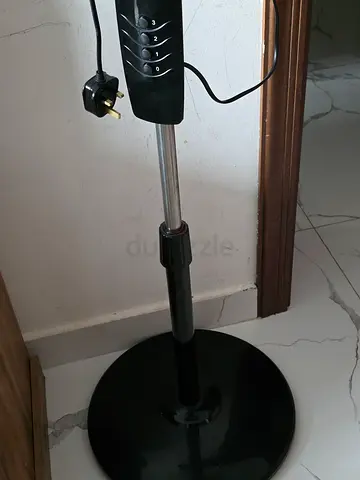 Black standing fan lightly used