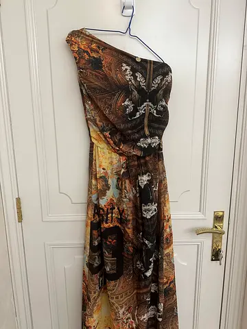 Elegant Roberta Biagi one-shoulder maxi dress with a striking artistic print and statement details.