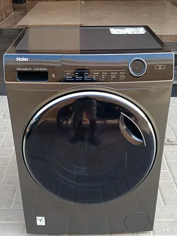 front load latest model HAIER 9kg washing machine, perfectly working condition.  one month warranty
