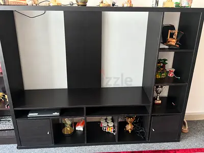 Dark wood entertainment TV unit with shelves and cabinets - good condition