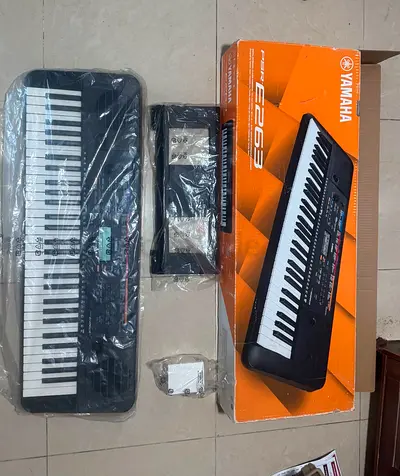 Yamaha portable keyboard (E263) with box — very good condition