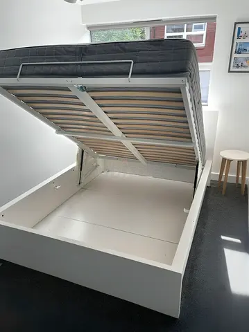 Ikea hydrullic queen bed with ikea mattress like new - Excellent condition