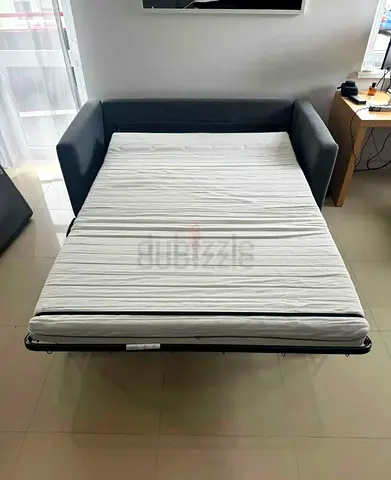 Grey fabric sofa bed with mattress - good condition