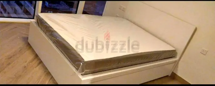 Ikea king size bed with mattress and storage drawers