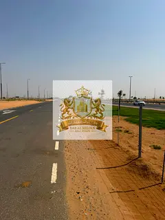 Commercial land for sale in Al-Rahmaniyah project, 7000 sq ft, on Bridge 5, freehold for Arabs
