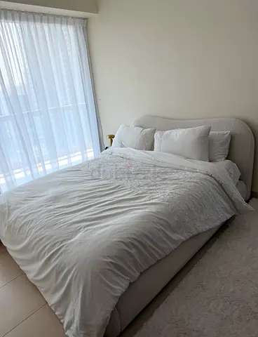 Double bed frame with upholstered headboard - modern neutral design. Used for 4 months only