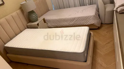 Two single beds with mattresses - good condition (no head board)